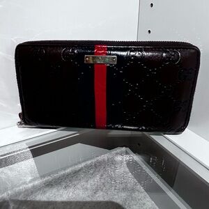 Gucci Brown Wallet with blue and Red Stripe.